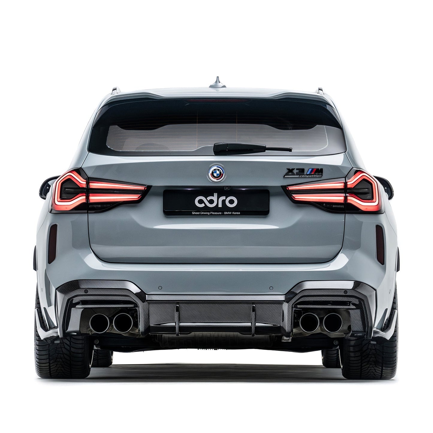 Rear carbon-fiber diffuser panel with quad exhaust tips