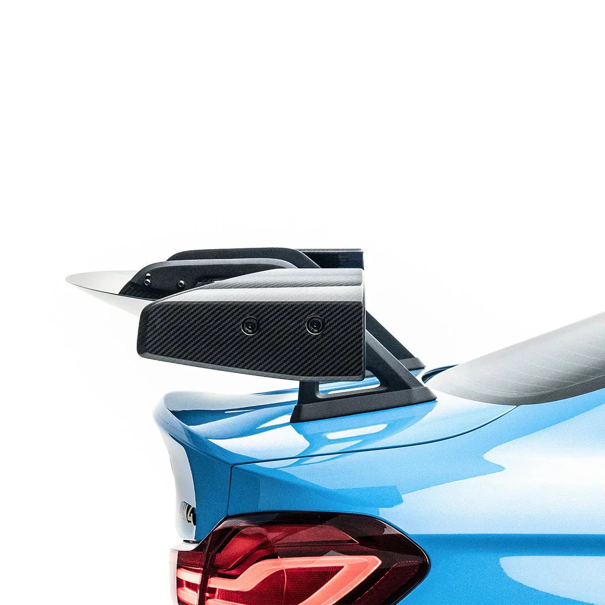Carbon-fiber swan-neck wing endplate with black supports and mounting hardware