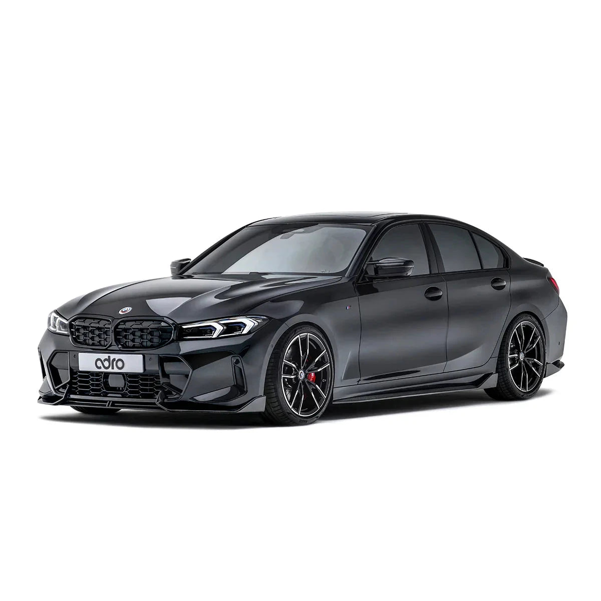ADRO carbon fiber front lip on BMW G20 M340i, front view, black paint, tinted windows, white background.