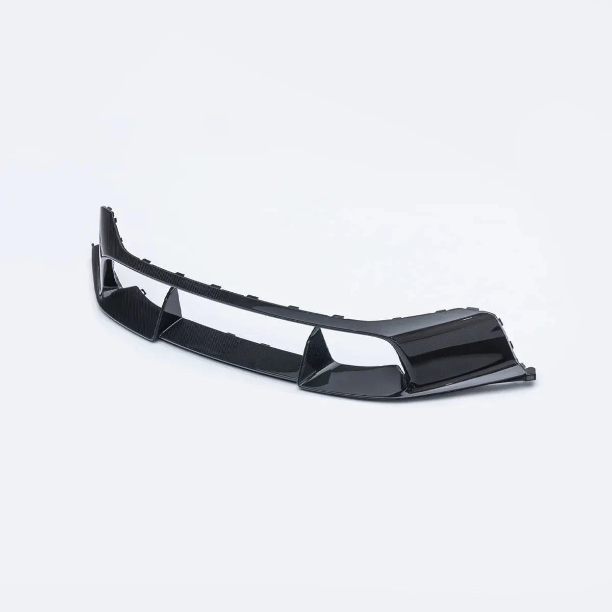 Front intake panel, black carbon-weave aerodynamic vent with central cutout and side tabs