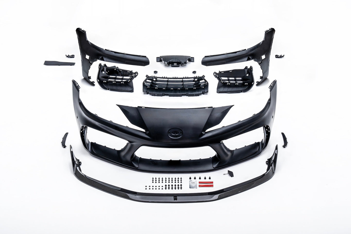 Toyota GR Supra front bumper components set, black and gray plastic parts
