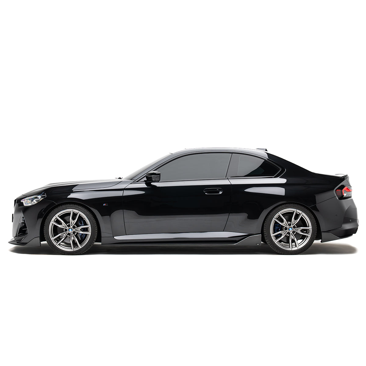Carbon fiber rear diffuser edge visible under the rear bumper