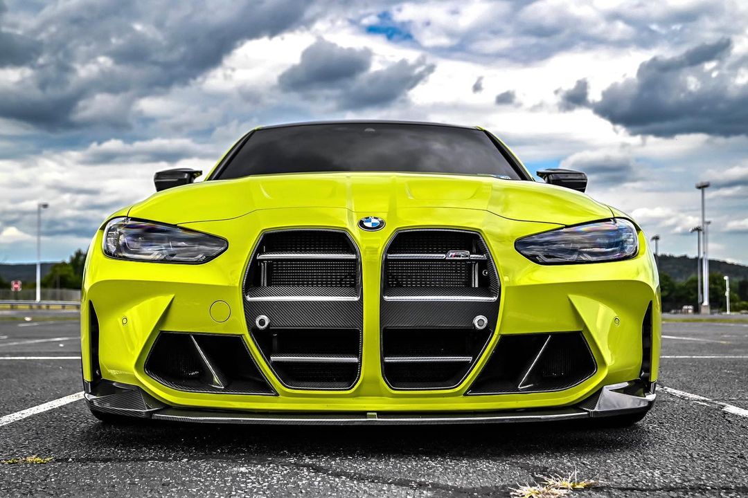Front-mount heat exchanger installed behind front grille on performance car