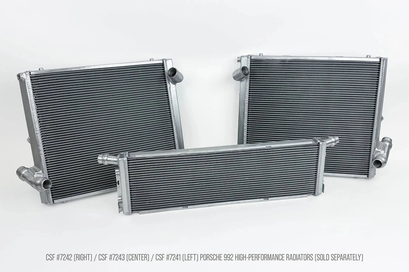 Three aluminum radiators shown: left, center, and right, with black cooling cores