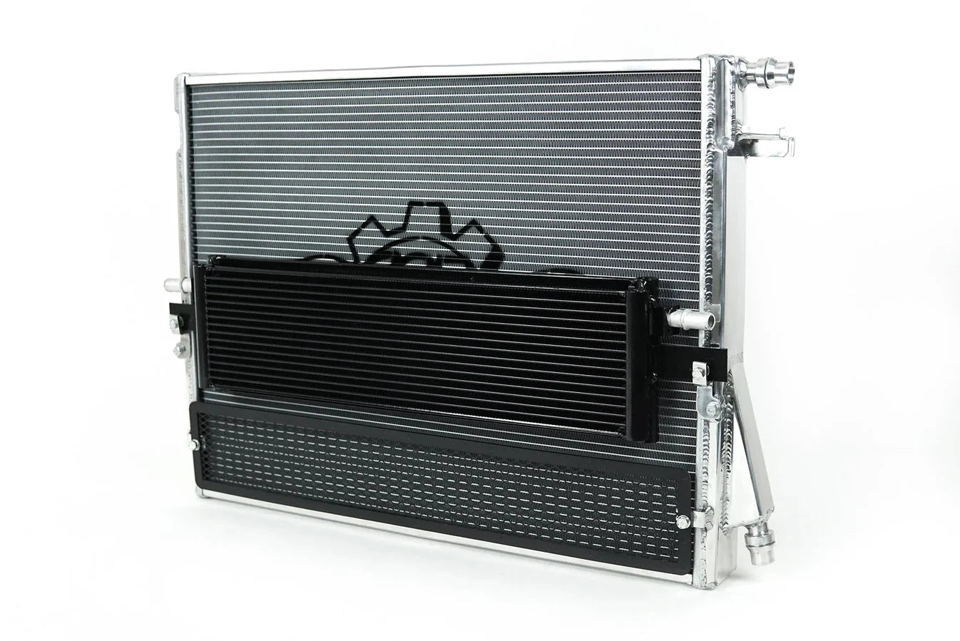 Silver and black transmission cooler radiator with stacked fin cores and fittings