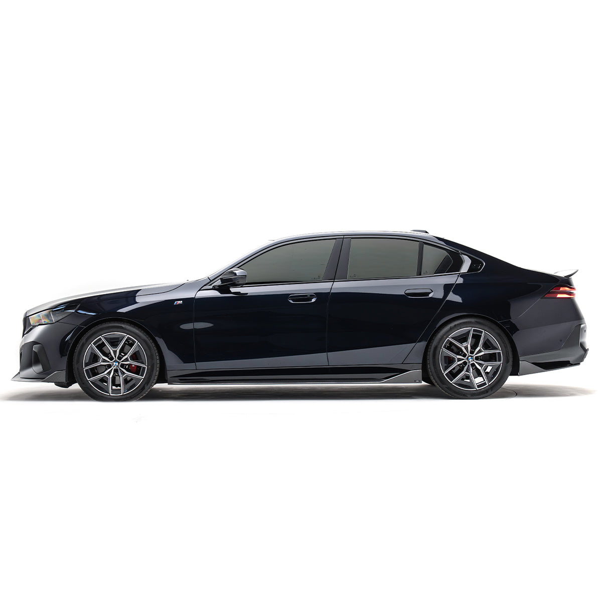 BMW 5 Series carbon fiber rear winglettes, matte black side fins on rear