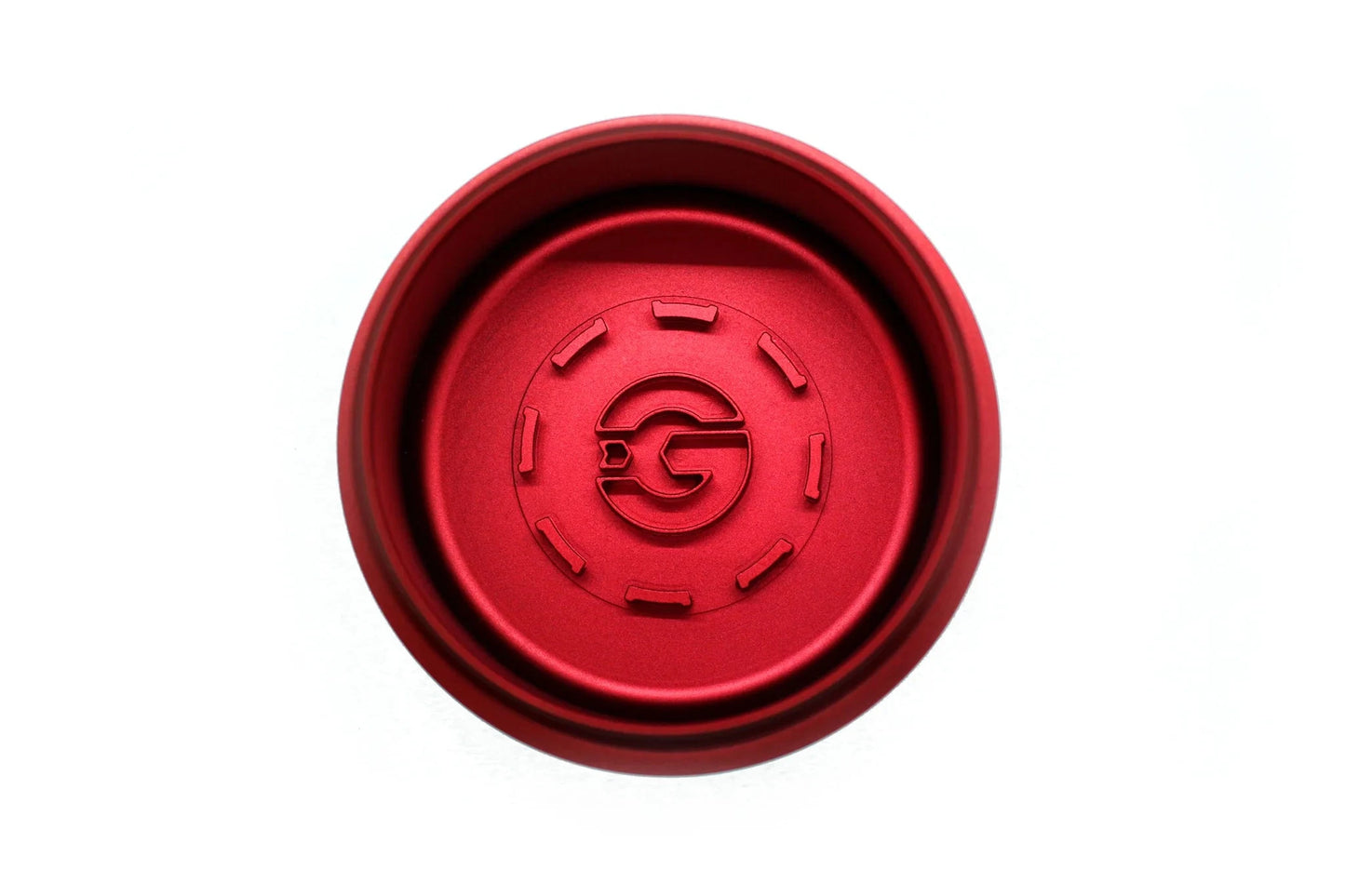 Oil filter housing cap, red underside with central G logo and raised segments