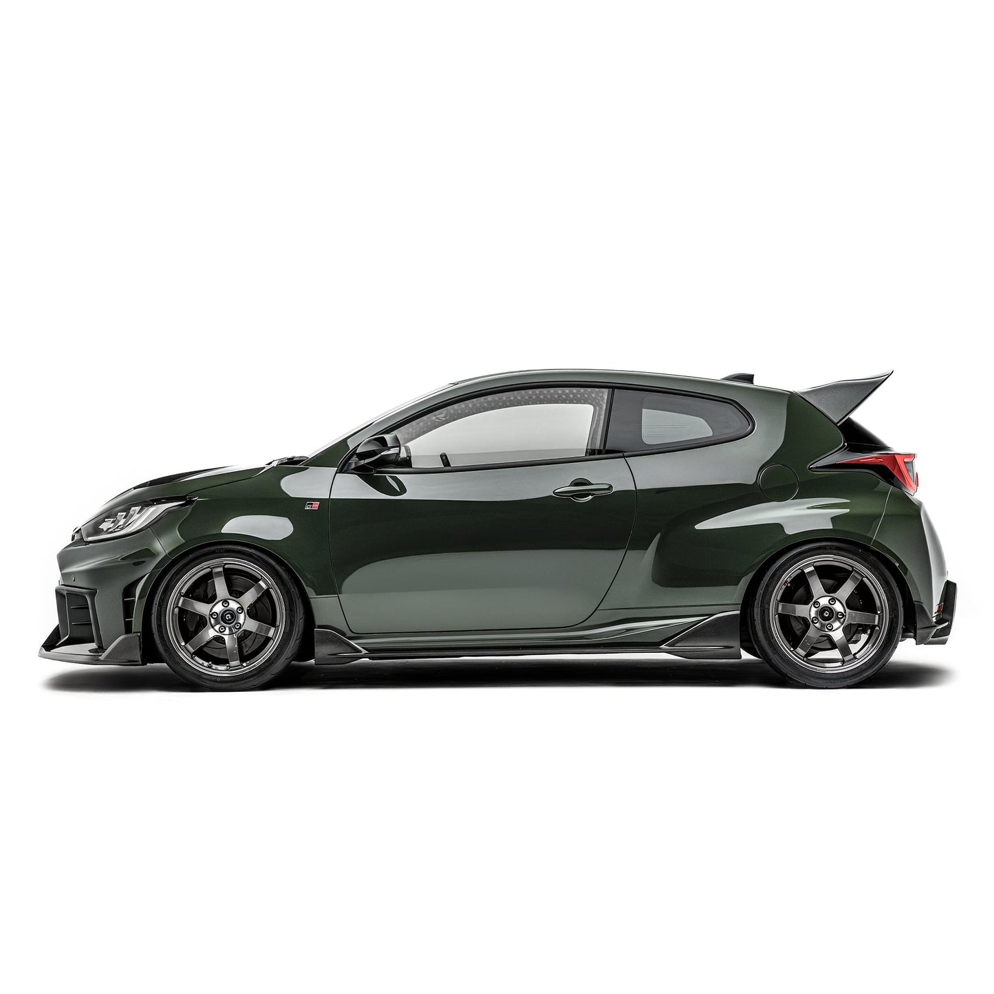 ADRO carbon fiber rear diffuser on Toyota GR Yaris Gen 2, shown in a side profile view.