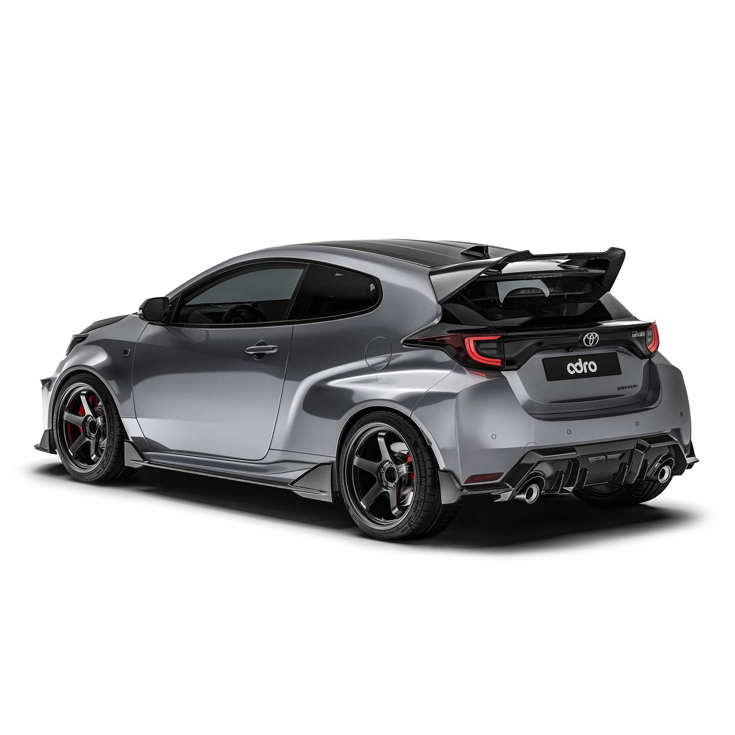 Carbon fiber side skirt with low-profile fins, shown on Toyota GR Yaris rear side.