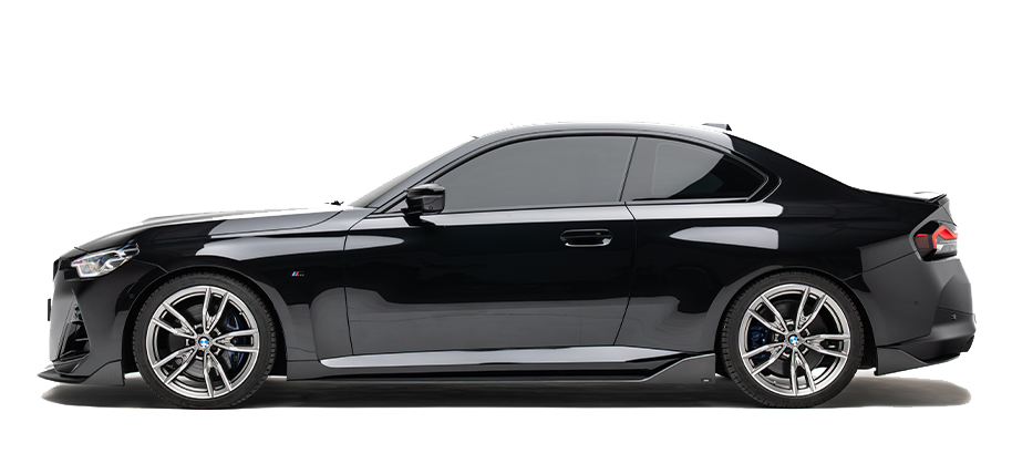 BMW G42 M240i coupe in black, side view with alloy wheels