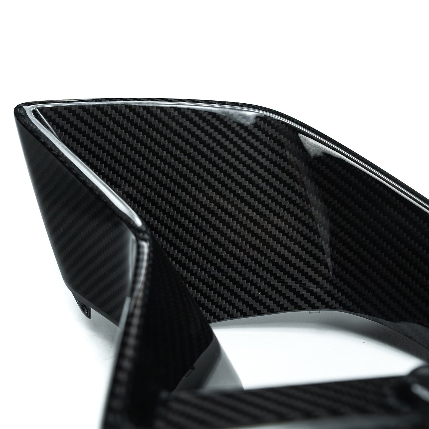 Carbon fiber duct vent side piece with glossy black weave and silver edge trim
