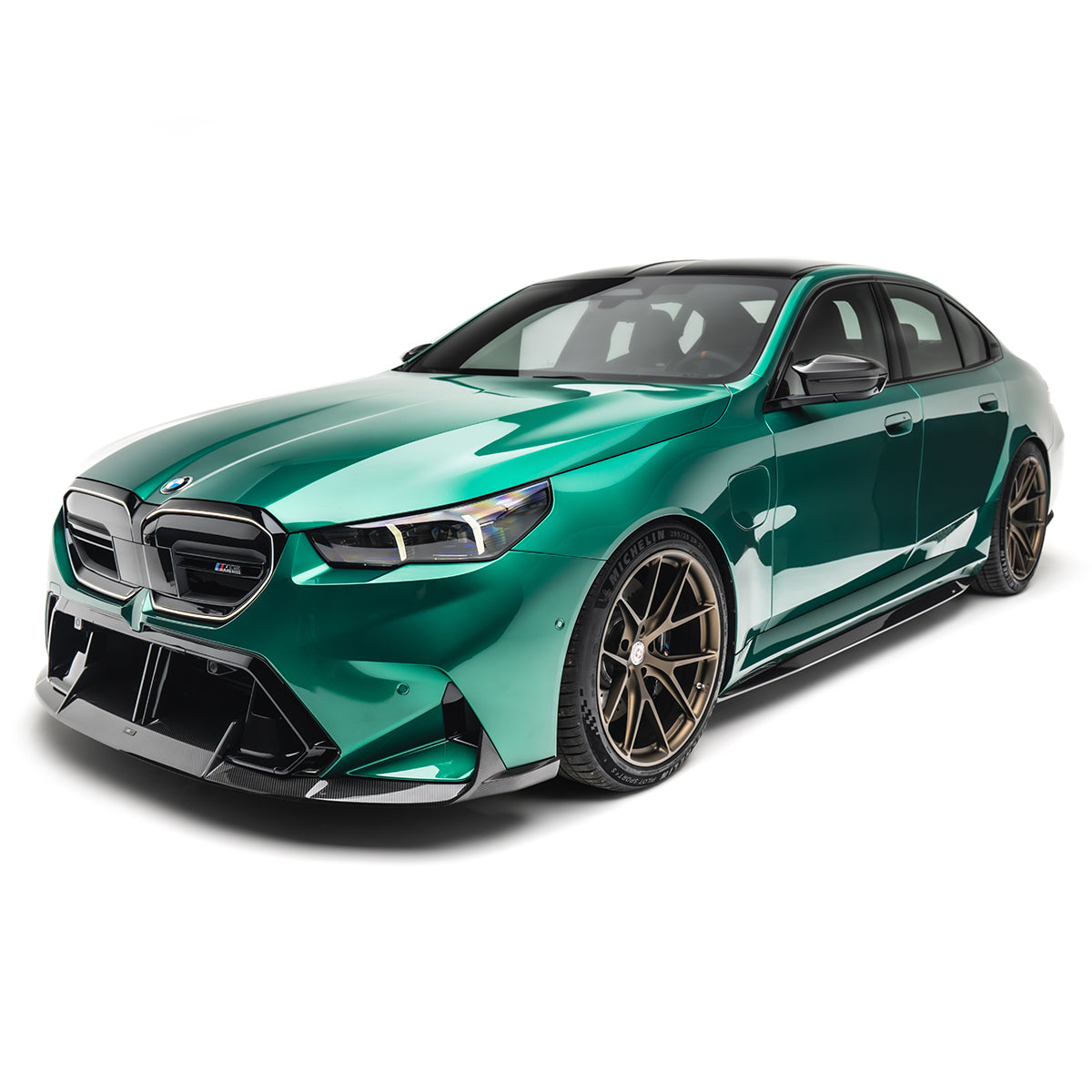 Front lip spoiler and splitter with black carbon-fiber canards on a green front bumper
