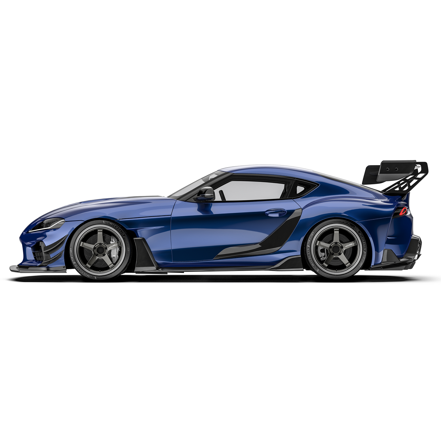 Side view: black carbon-fiber front splitter lip on blue sports coupe