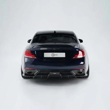 Blue performance sedan rear view with tail lights, diffuser, and dual exhaust tips