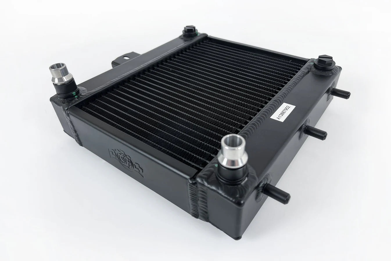 Auxiliary radiator with black fin core and hose fittings, matte black end tanks
