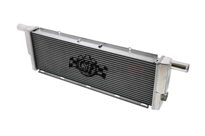 All-aluminum center radiator with dark fin core and silver frame with mounting tabs