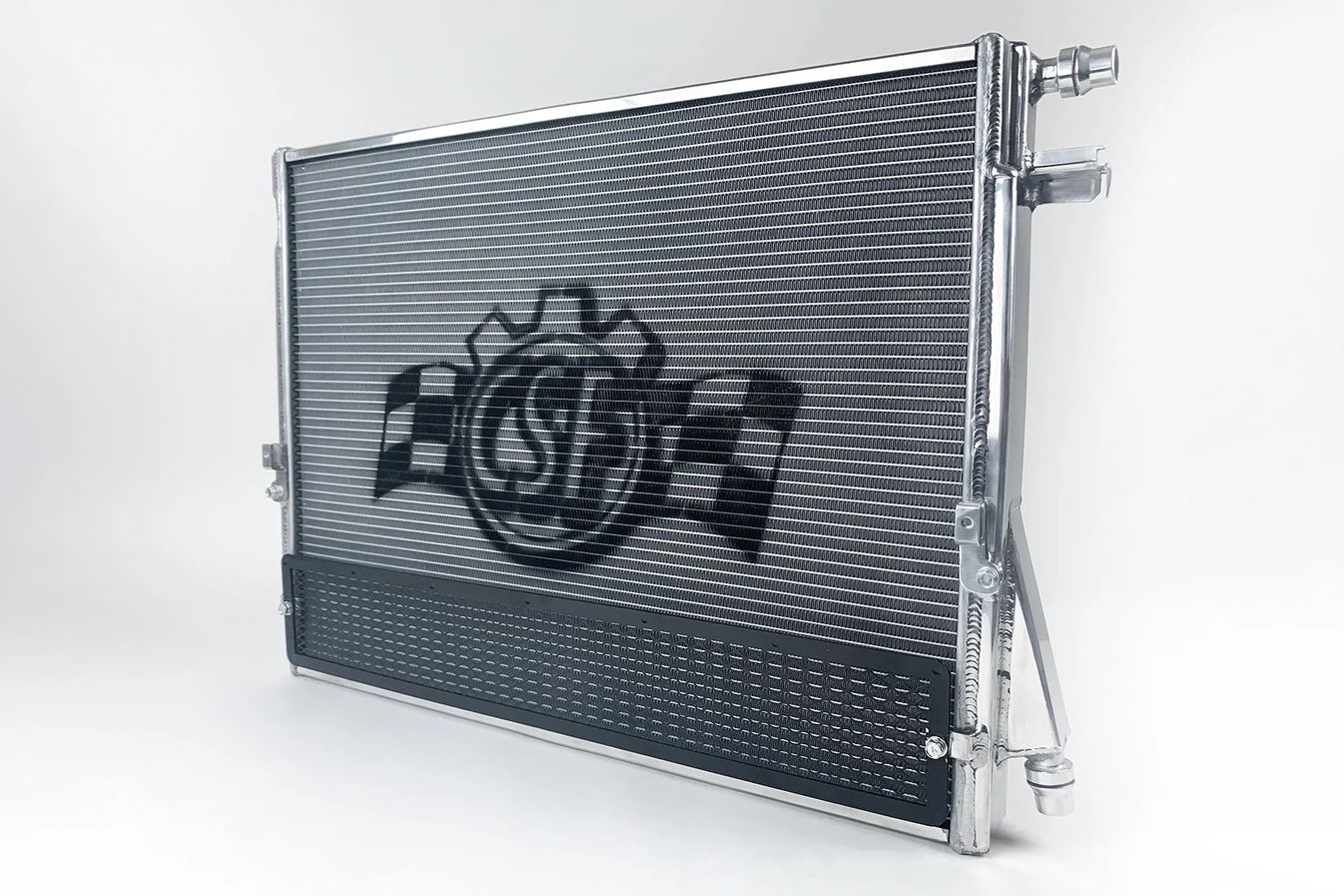 Performance heat exchanger radiator with protective rock guard and hose fittings