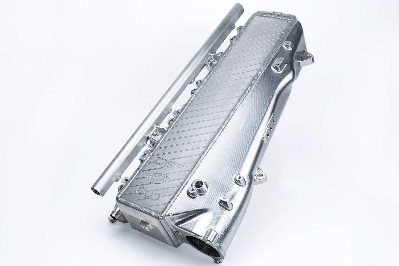 Charge-air cooler manifold, silver aluminum with finned heat exchanger and mounting ports