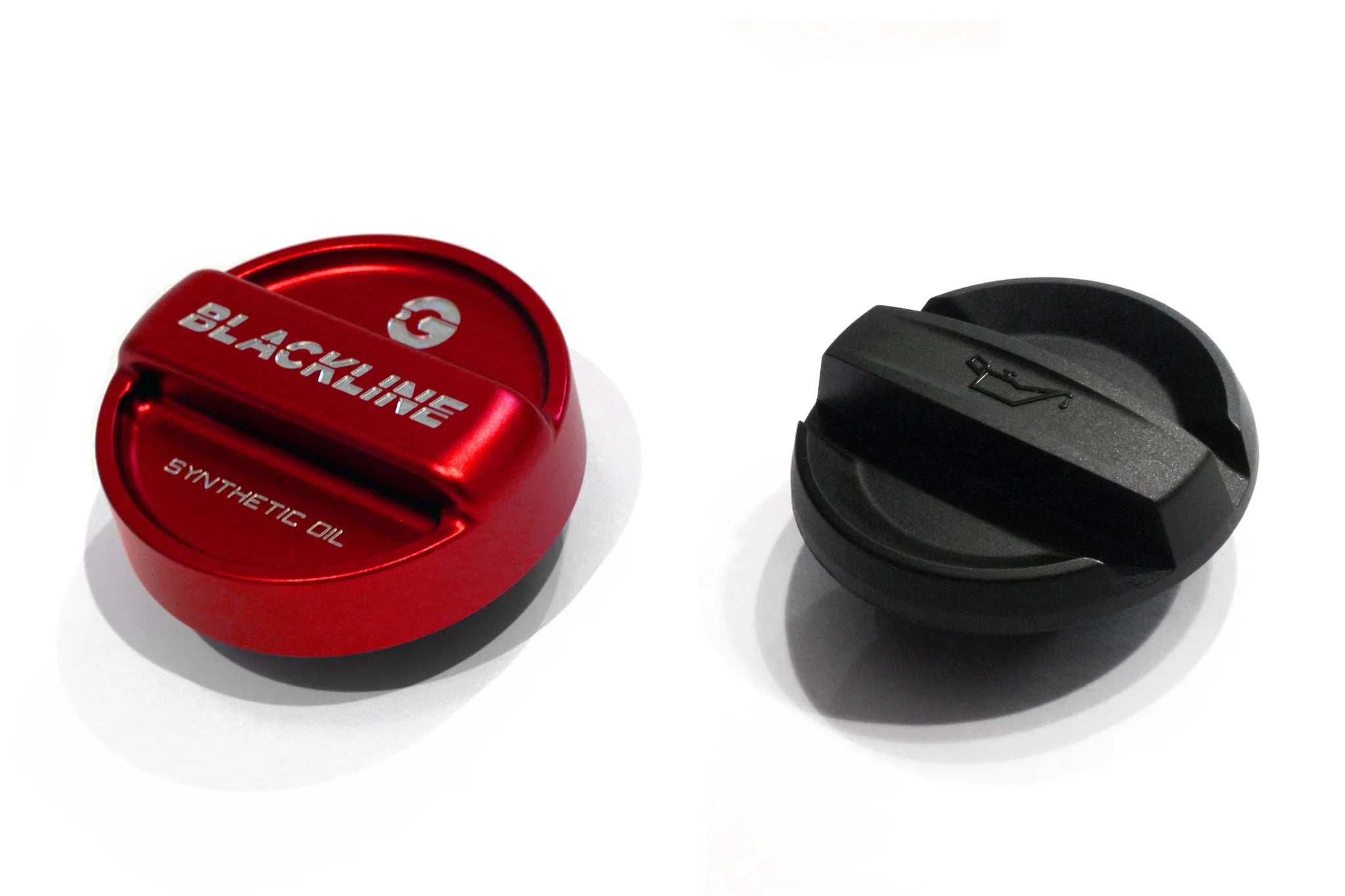 Red and black oil cap covers, one labeled BLACKLINE, both round