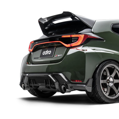 ADRO carbon fiber rear diffuser on Toyota GR Yaris, rear view, with visible ADRO branding.