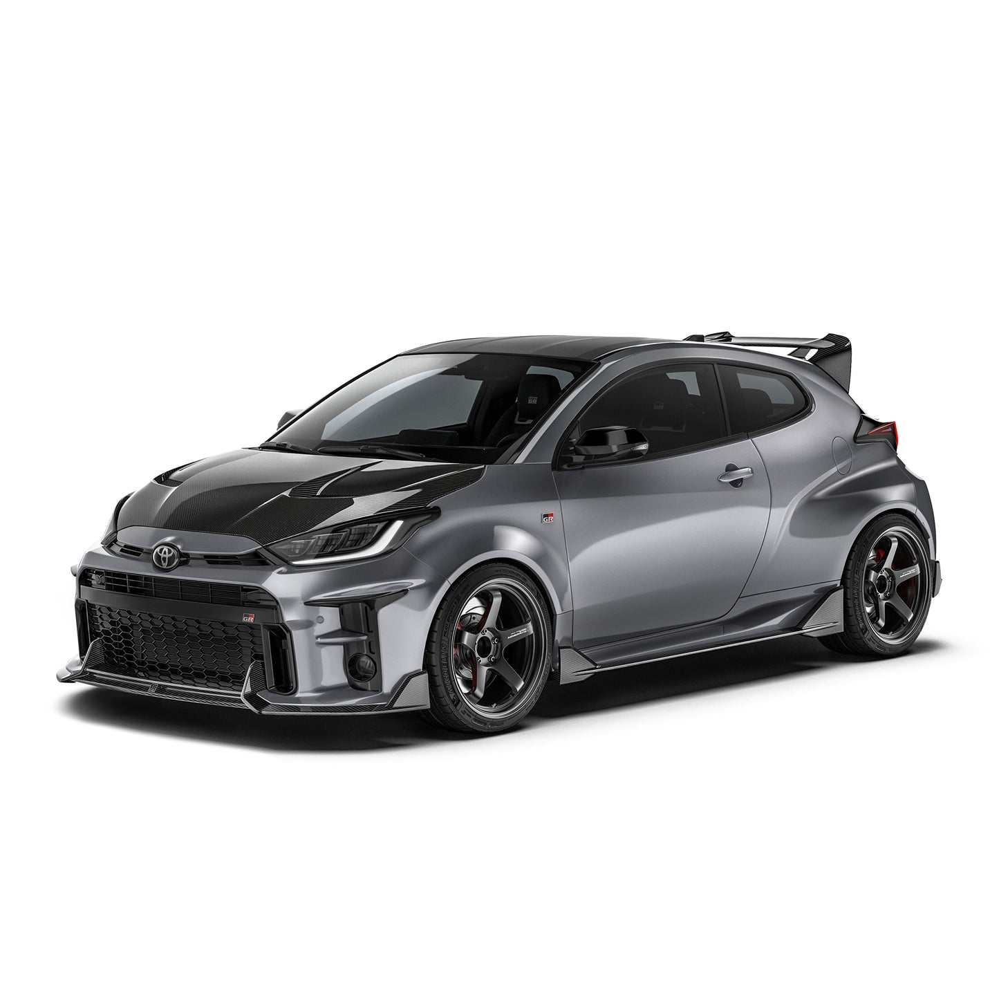 Carbon fiber side skirt with angled aero shape, shown on Toyota GR Yaris front side.