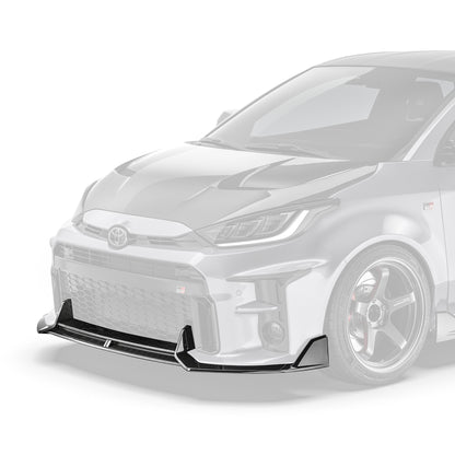 Carbon fiber front lip with dark woven texture, mounted at the lower front bumper edge.