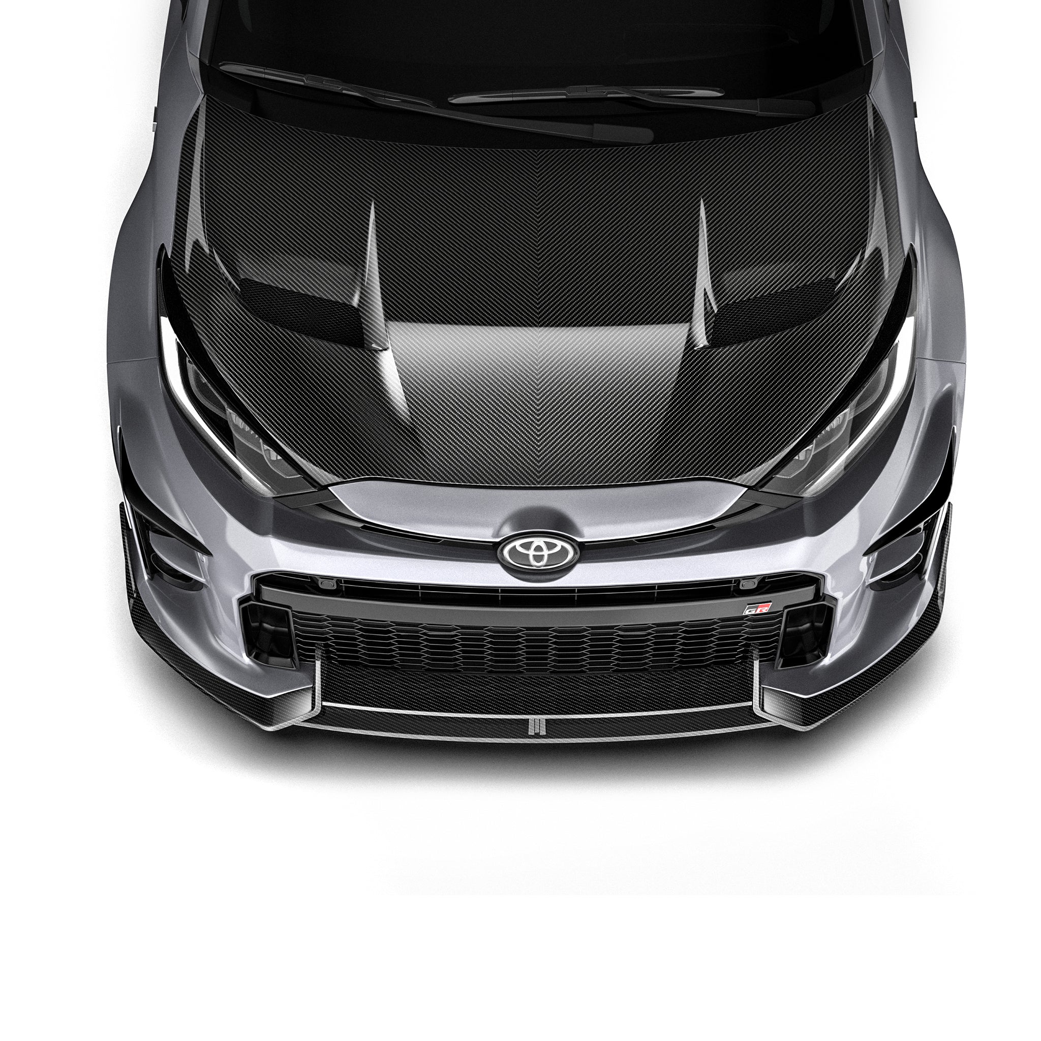 Carbon fiber front lip panel with dark texture, seen from a centered front view.