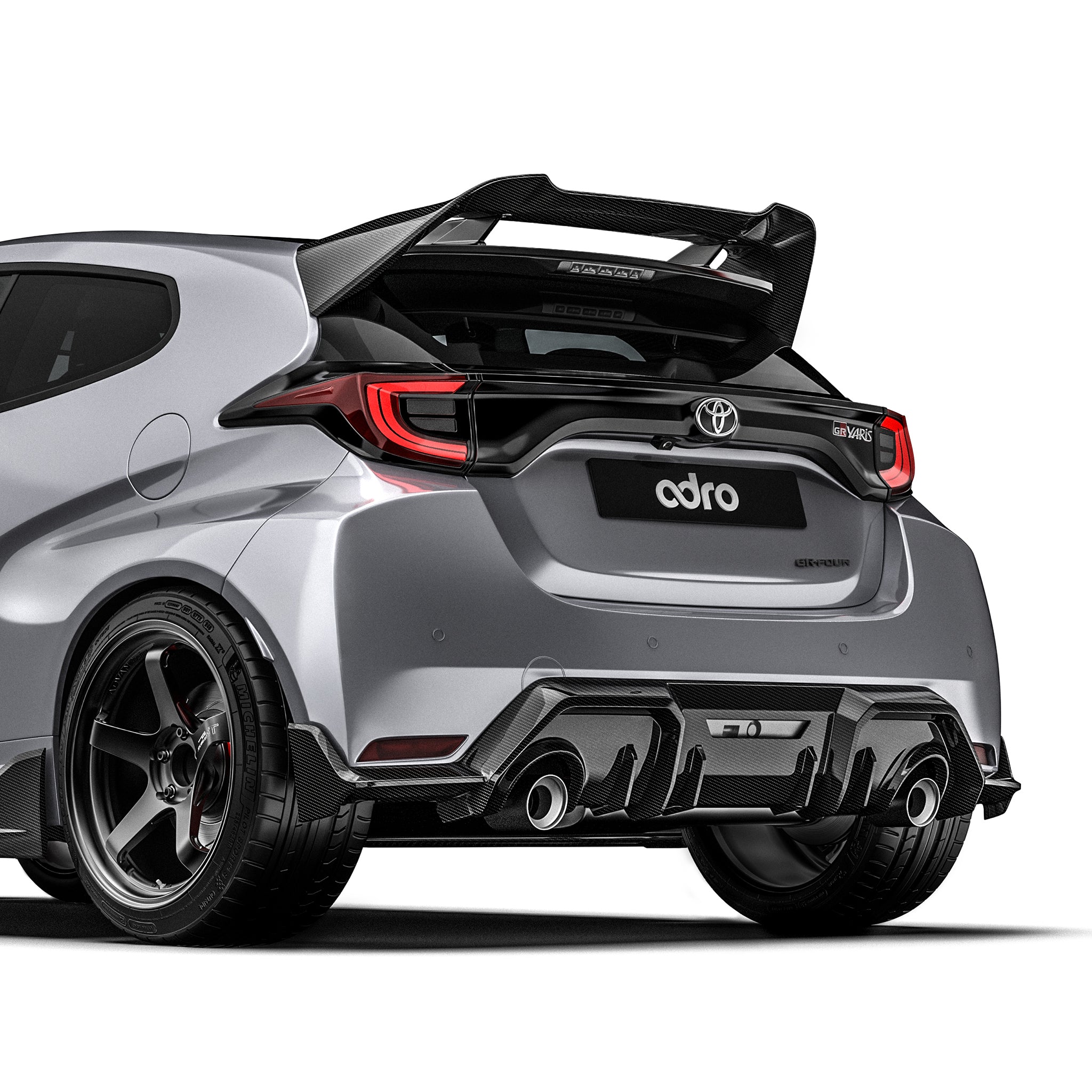 Carbon fiber rear diffuser panel with black weave finish and twin exhaust outlets