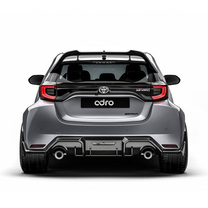 Carbon fiber rear diffuser with black woven trim and twin round exhaust outlets