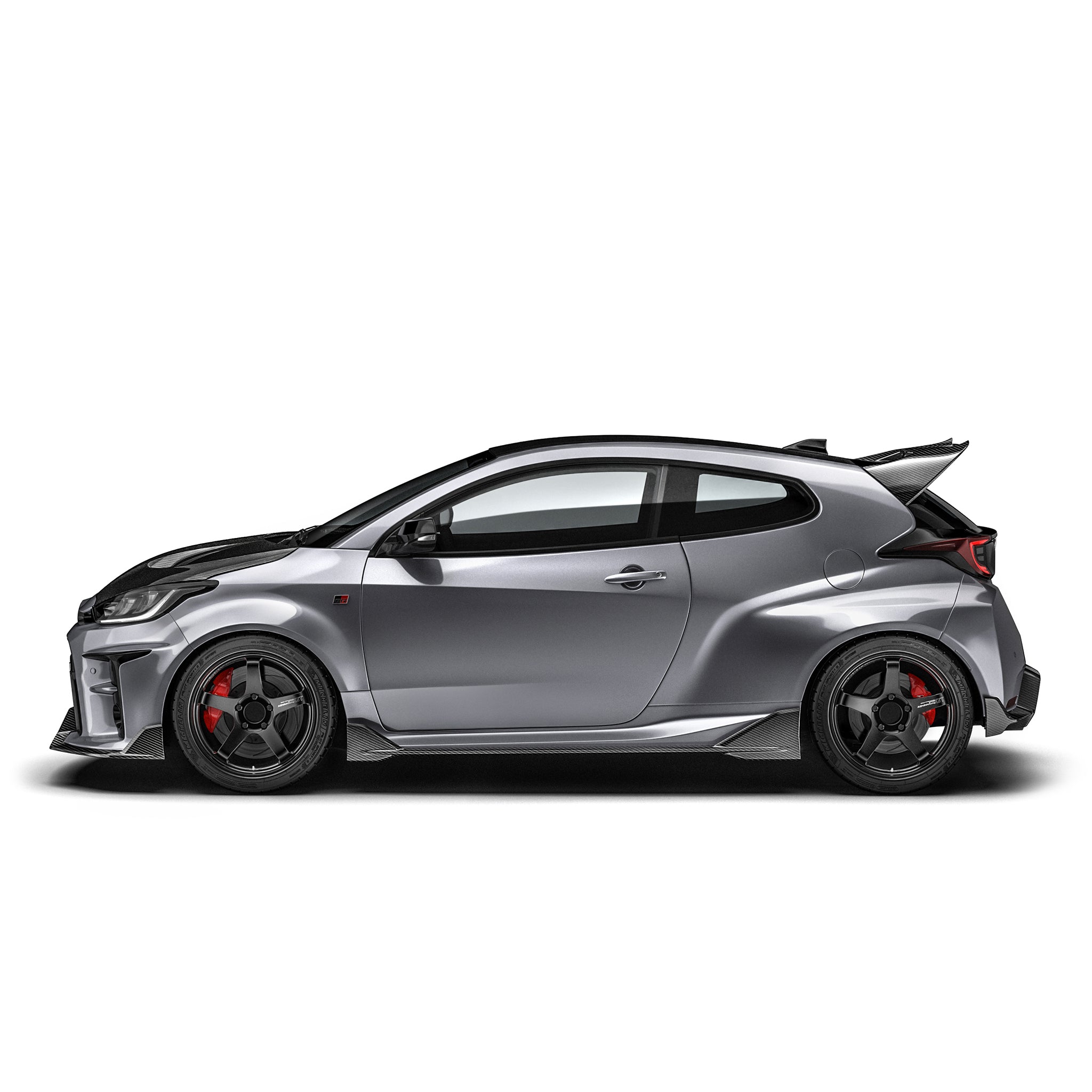 Carbon fiber side skirt, shown on Toyota GR Yaris in dark gray side view.