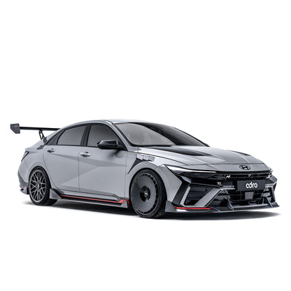 Rear diffuser under tray, black finned aero trim with exhaust outlet openings