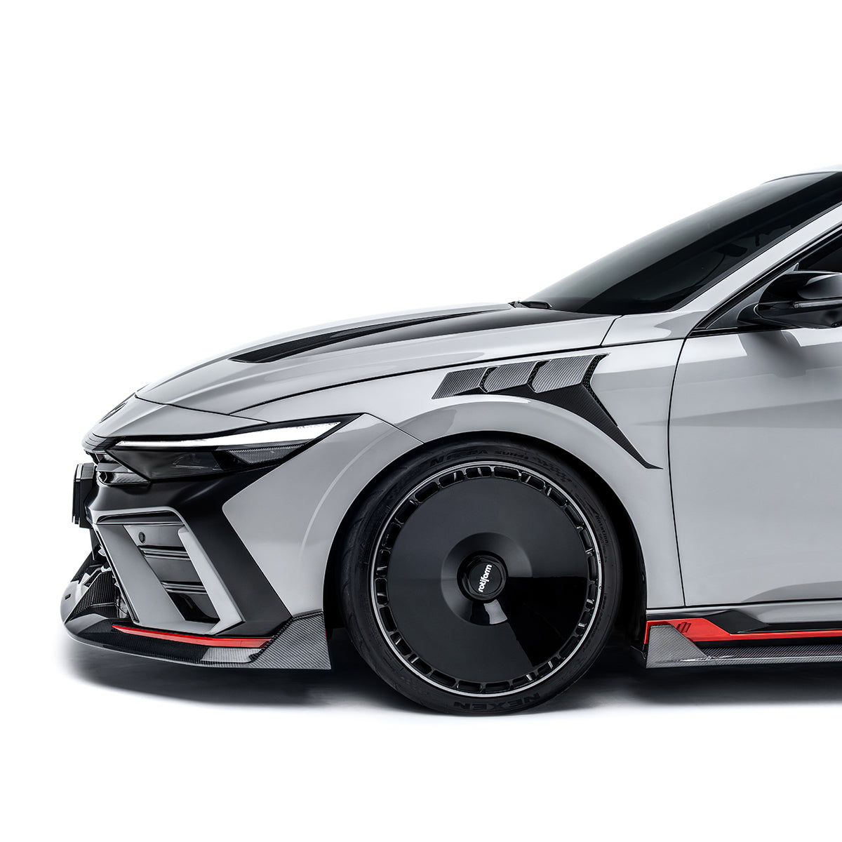 Front bumper aero trim and grille, black and dark gray textured inserts