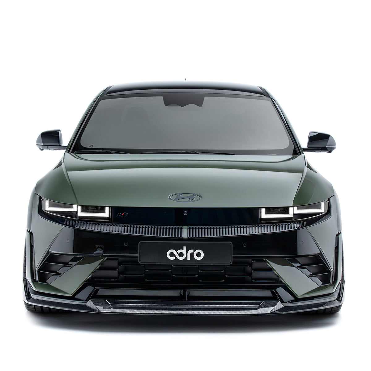 Carbon fiber front lip spoiler for a car, black, low profile with center recess