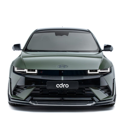 Carbon fiber front lip spoiler for a car, black, low profile with center recess