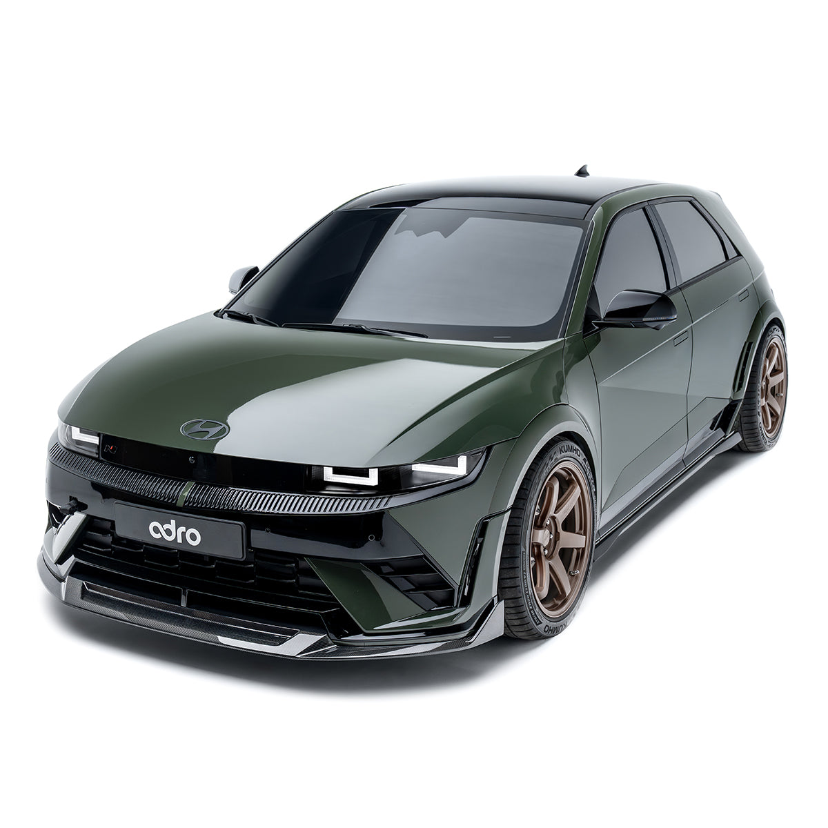 Front-side carbon-fiber style side skirt with black textured surface and silver trim