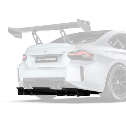 Race rear diffuser with carbon-fiber fins and exhaust cutouts on sports car
