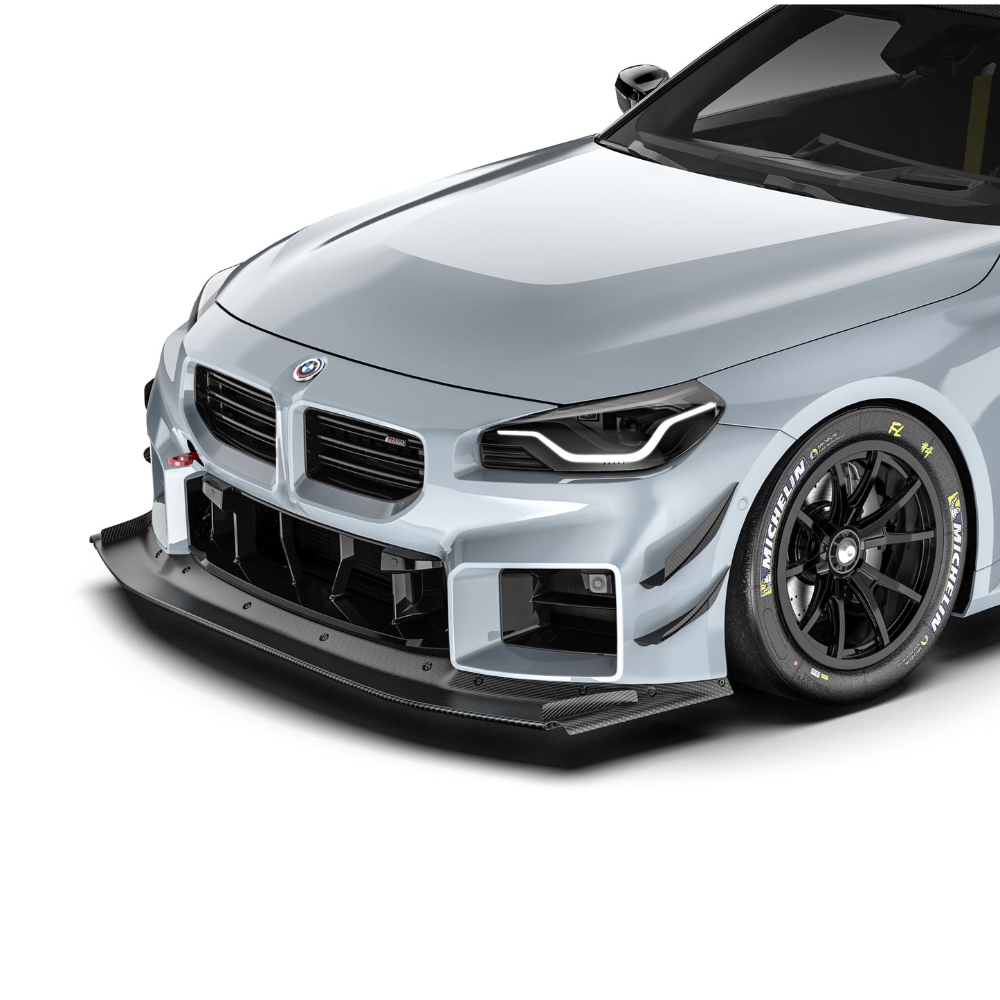 BMW G87 M2 front splitter, black lip with carbon weave texture along bumper edge