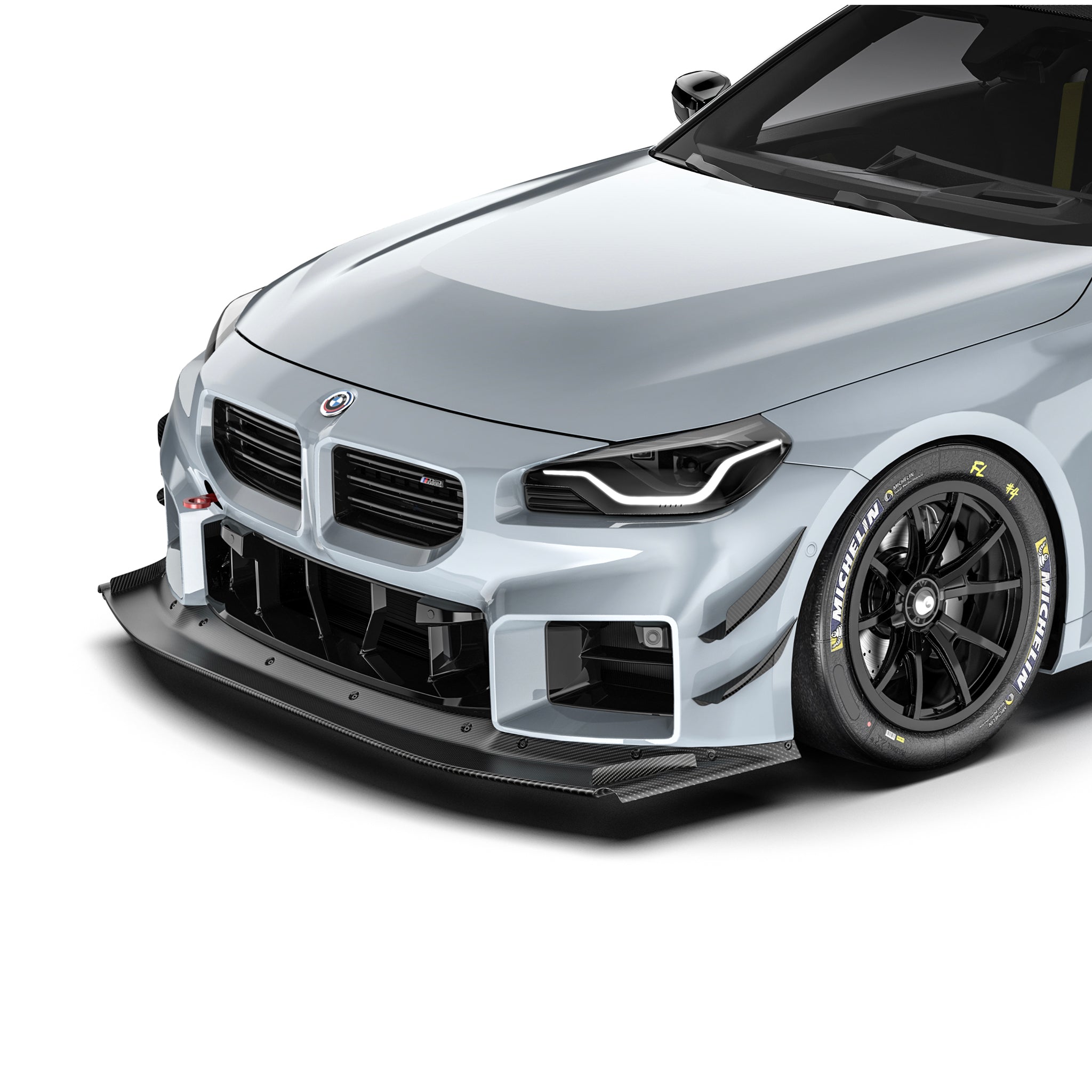 BMW G87 M2 front splitter, black lip with carbon weave texture along bumper edge