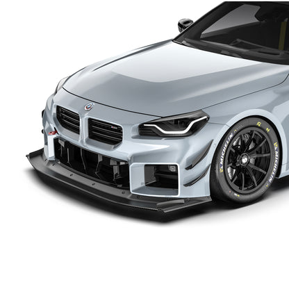 BMW G87 M2 front splitter, black lip with carbon weave texture along bumper edge