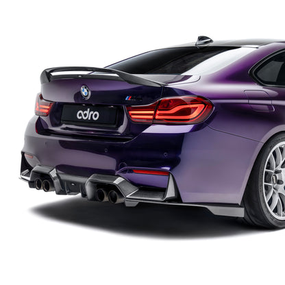 Carbon fiber rear diffuser with quad exhaust outlets, rear corner view