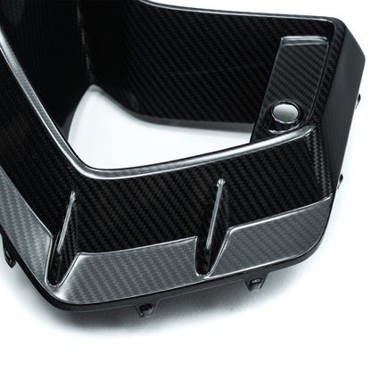 Carbon fiber bumper duct vent cover with round grommet hole and channel vent cutouts
