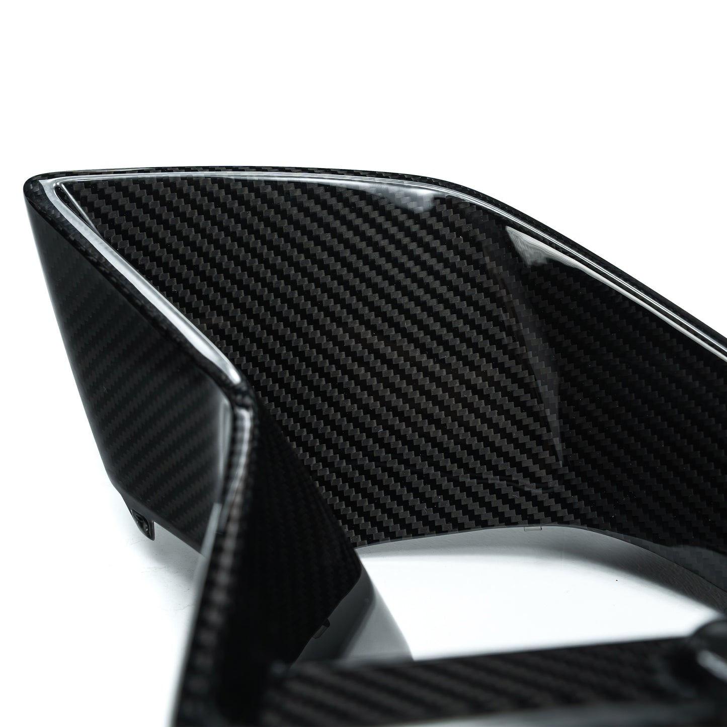 Carbon fiber duct vent side piece with glossy black weave and silver edge trim