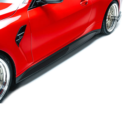 BMW M4 side skirt close-up with textured black edge along lower rocker