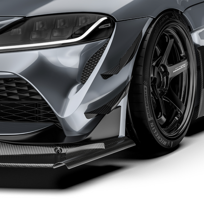 Front bumper carbon fiber canards with textured black finish and angled profile