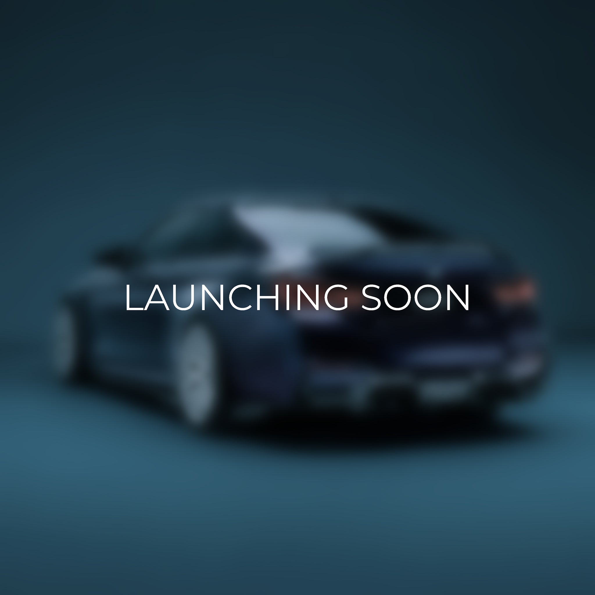 Sports coupe rear end, diffuser area partially obscured by overlay text