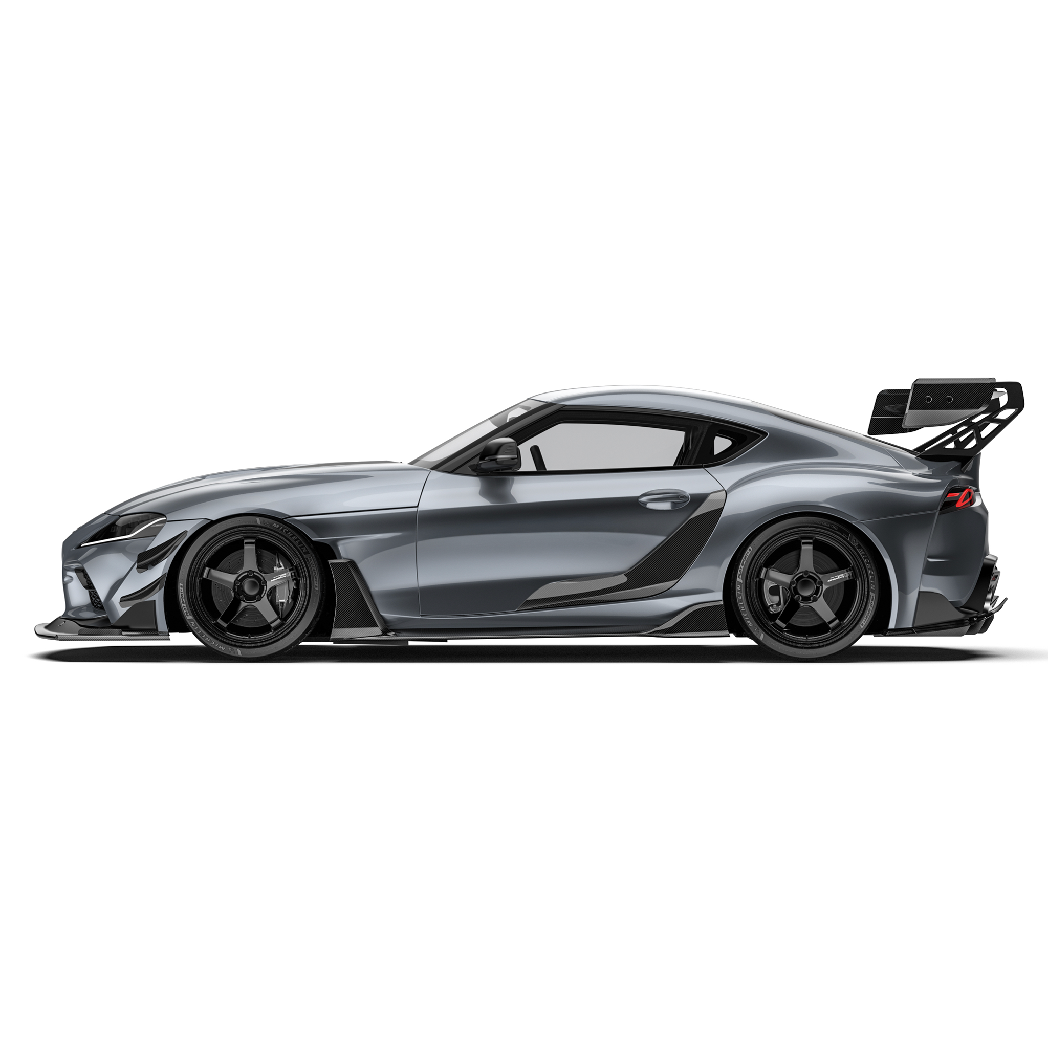 Toyota GR Supra side view featuring carbon fiber front bumper canards