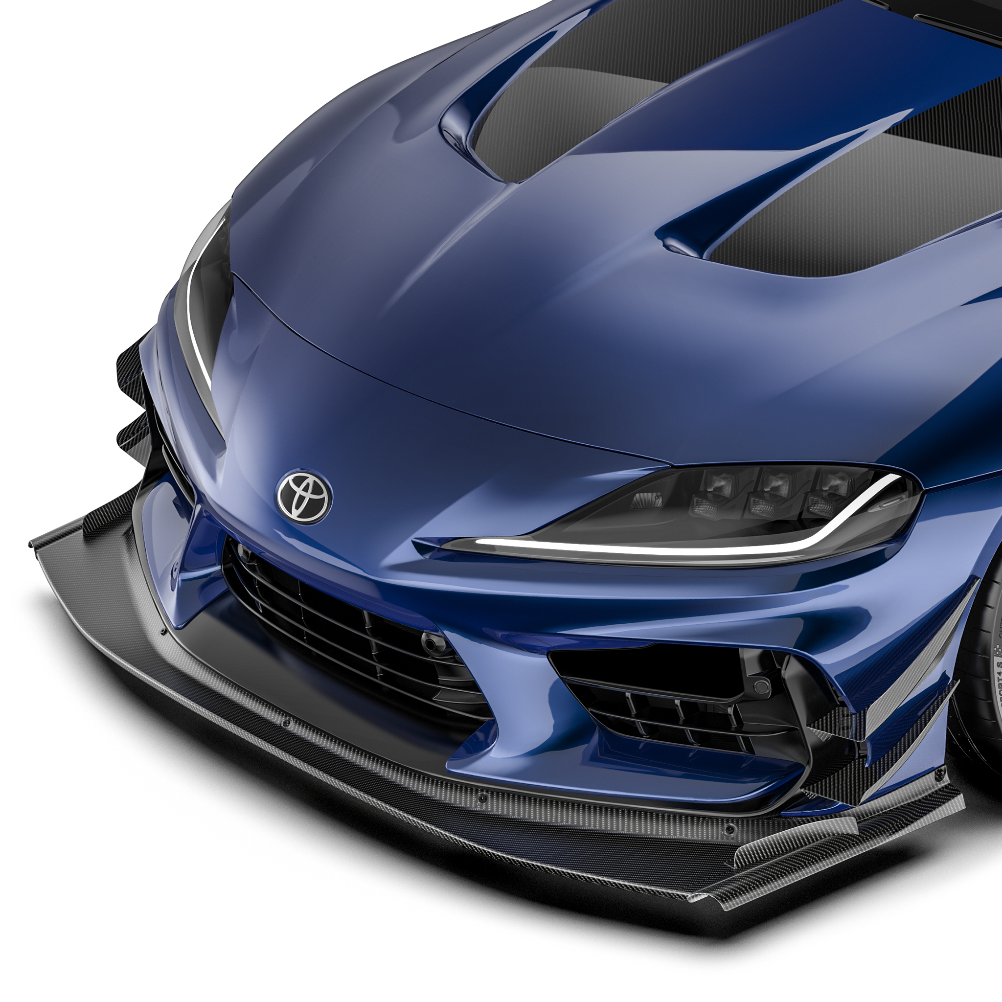 Front bumper race splitter with black carbon-fiber lip on blue sports car